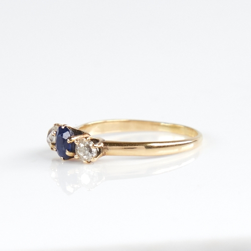 1138 - An early 20th century 18ct gold 3-stone sapphire and diamond ring, total diamond content approx 0.3c... 