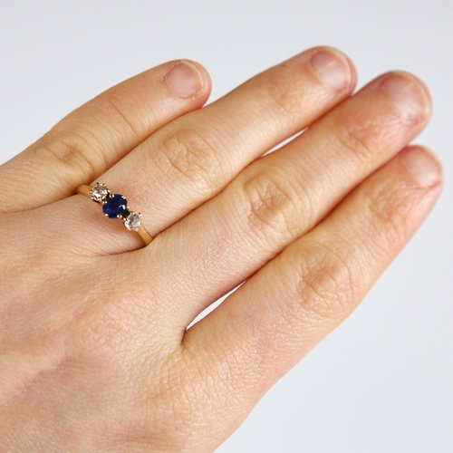 1138 - An early 20th century 18ct gold 3-stone sapphire and diamond ring, total diamond content approx 0.3c... 