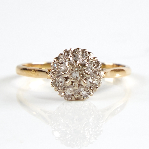 1147 - A late 20th century 18ct gold diamond cluster ring, total diamond content approx 0.2ct, setting heig... 