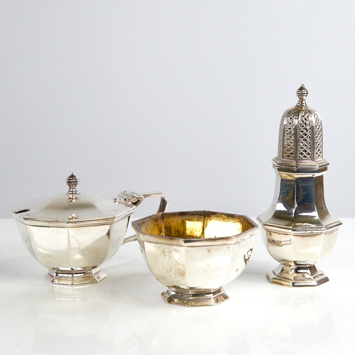 1150 - An Elizabeth II silver 3-piece cruet set, comprising baluster pepperette, mustard pot and salt, plai... 