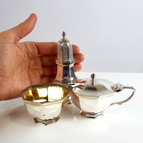 1150 - An Elizabeth II silver 3-piece cruet set, comprising baluster pepperette, mustard pot and salt, plai... 