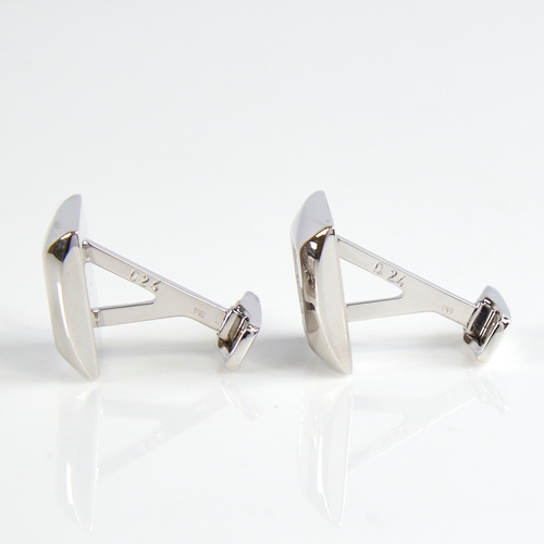 1155 - A modern pair of 18ct white gold diamond cluster cufflinks, square panels set with round brilliant-c... 