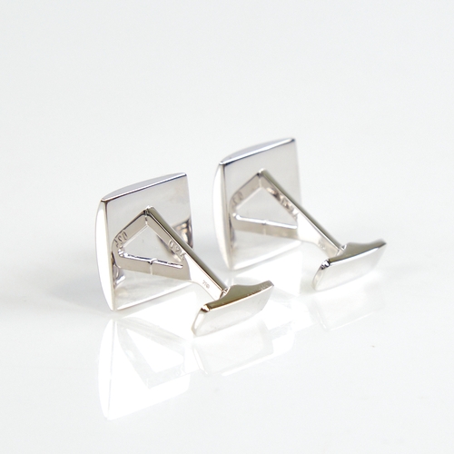 1155 - A modern pair of 18ct white gold diamond cluster cufflinks, square panels set with round brilliant-c... 