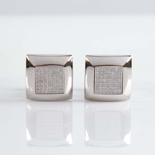 1155 - A modern pair of 18ct white gold diamond cluster cufflinks, square panels set with round brilliant-c... 