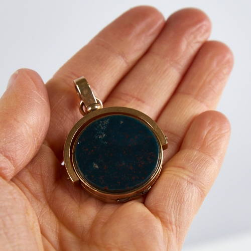 1159 - A 19th century 10ct gold swivel seal fob/locket, set with polished bloodstone and sardonyx and appli... 