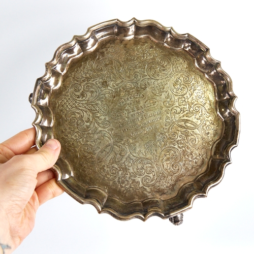 1167 - A Victorian silver salver, circular form with scalloped rim, floral and foliate engraved decoration ... 