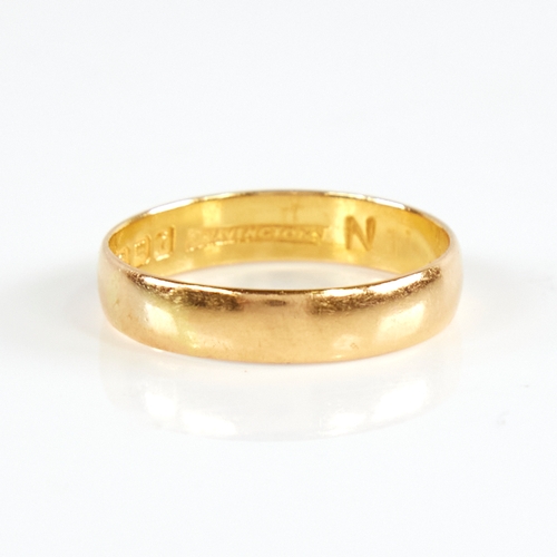 1169 - A mid-20th century 22ct gold wedding band ring, retailed by Bravingtons, hallmarks London 1964, band... 