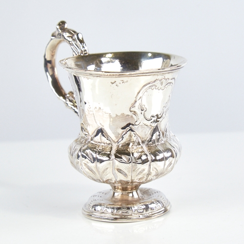 1173 - A William IV silver christening mug, thistle form with scrolled acanthus leaf handle and baluster bo... 