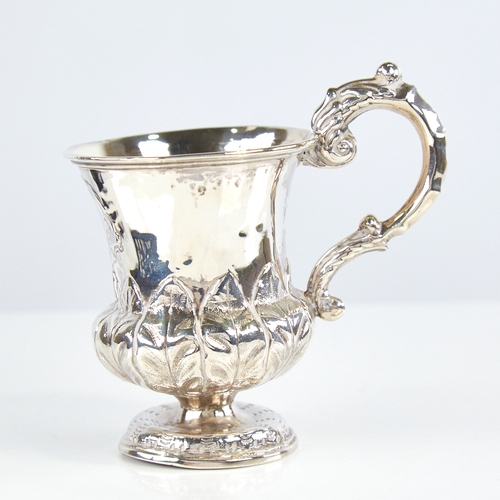 1173 - A William IV silver christening mug, thistle form with scrolled acanthus leaf handle and baluster bo... 