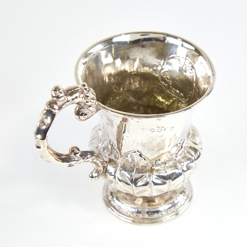 1173 - A William IV silver christening mug, thistle form with scrolled acanthus leaf handle and baluster bo... 