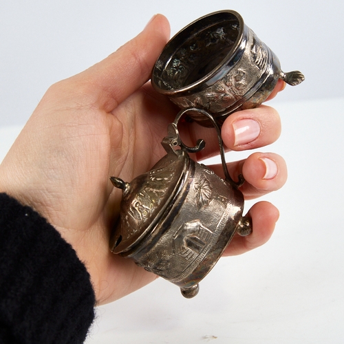 1177 - An early 20th century Indian unmarked silver 2-piece cruet set, comprising mustard pot and salt cell... 