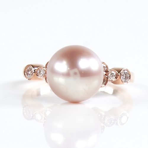 1187 - A modern 14ct rose gold pearl and diamond dress ring, set with whole pink South Sea pearl and round ... 