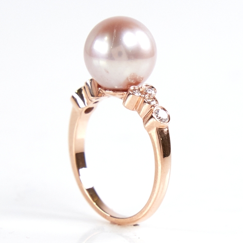 1187 - A modern 14ct rose gold pearl and diamond dress ring, set with whole pink South Sea pearl and round ... 