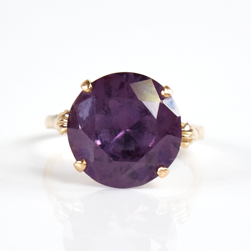 1188 - A late 20th century 18ct gold synthetic sapphire dress ring, sapphire diameter 14.6mm, size S, 6g