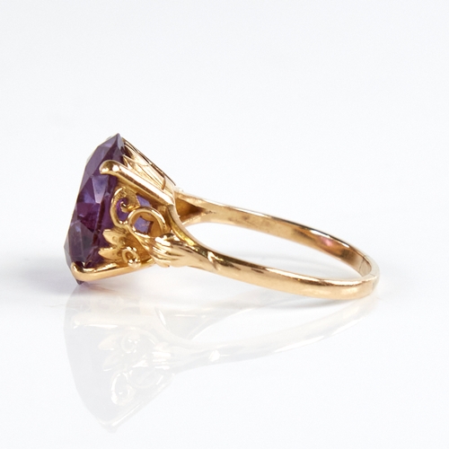 1188 - A late 20th century 18ct gold synthetic sapphire dress ring, sapphire diameter 14.6mm, size S, 6g