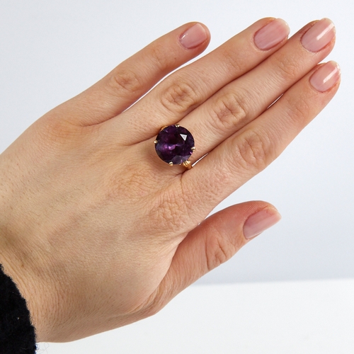 1188 - A late 20th century 18ct gold synthetic sapphire dress ring, sapphire diameter 14.6mm, size S, 6g