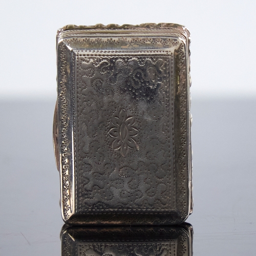 1191 - A George III silver vinaigrette, rectangular form with relief floral border and bright-cut engraved ... 