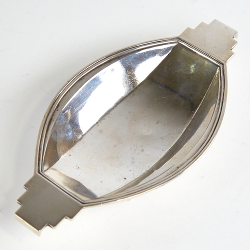 1199 - A small Art Deco silver bon bon dish, geometric design with stepped handles and pedestal base, by Go... 