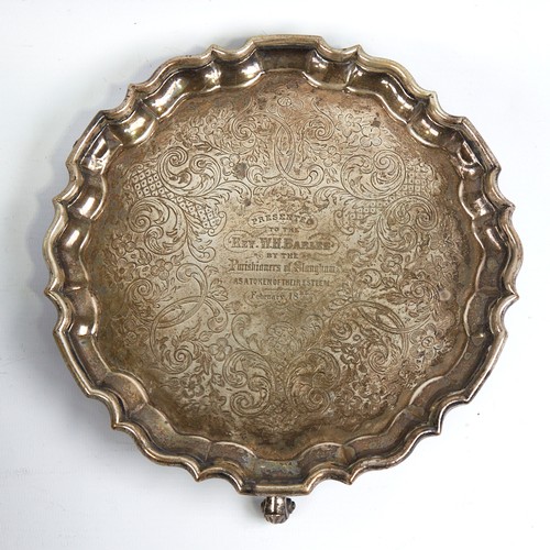 1167 - A Victorian silver salver, circular form with scalloped rim, floral and foliate engraved decoration ... 