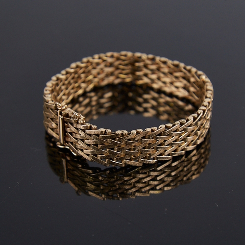 1208 - A Vintage 9ct gold bracelet, textured articulated form, band width 14.9mm, bracelet length 18cm, 39.... 