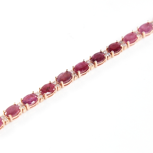 1210 - A modern 14ct rose gold ruby and diamond line bracelet, set with oval-cut rubies with double round b... 