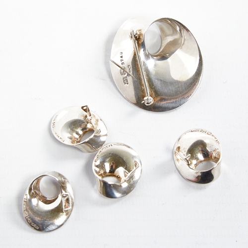 1216 - VIVIANNA TORUN BULOW-HUBE for GEORG JENSEN - a set of Danish sterling silver Mobius pattern jeweller... 