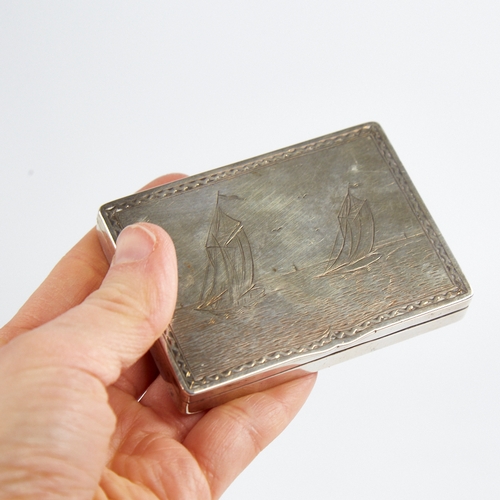 1220 - A George V silver table snuffbox, plain rectangular form with engraved sailing boat scene lid and gi... 