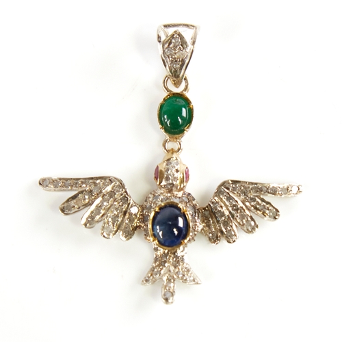 1222 - A modern Continental silver sapphire ruby emerald and diamond figural bird pendant, set with oval ca... 