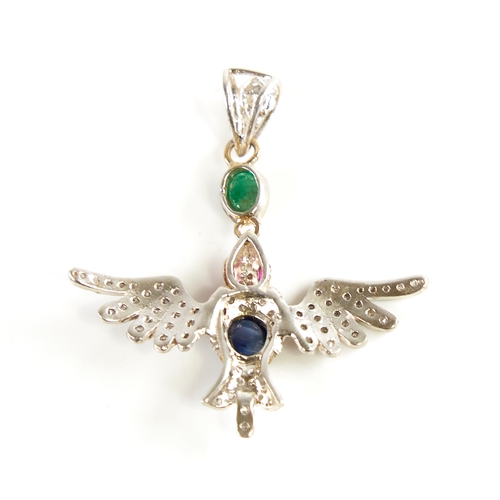 1222 - A modern Continental silver sapphire ruby emerald and diamond figural bird pendant, set with oval ca... 