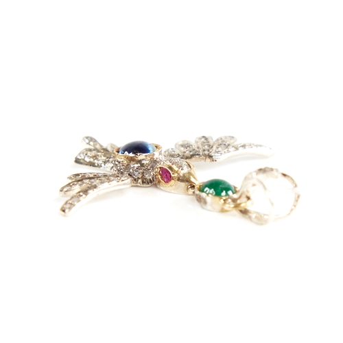 1222 - A modern Continental silver sapphire ruby emerald and diamond figural bird pendant, set with oval ca... 