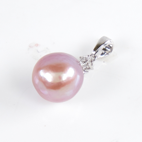 1224 - A modern 14ct white gold pink South Sea pearl and diamond pendant, round brilliant-cut diamond appro... 