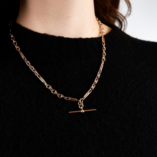 1226 - A modern unmarked 9ct rose gold fancy link double Albert chain necklace, elongated double-bar and ro... 