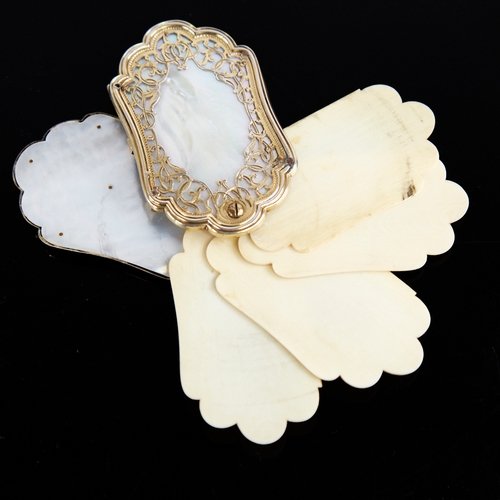 1232 - An Antique French Palais-Royal mother-of-pearl and silver-gilt dance card, fan opening to reveal 5 i... 