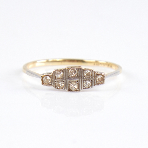 1240 - An Art Deco 18ct gold diamond panel ring, set with eight-cut diamonds with openwork bridge, total di... 