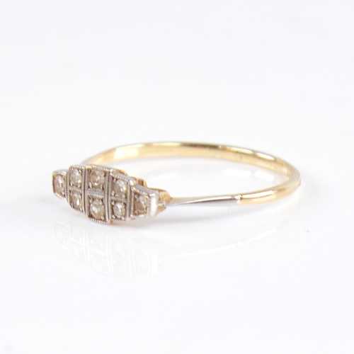 1240 - An Art Deco 18ct gold diamond panel ring, set with eight-cut diamonds with openwork bridge, total di... 