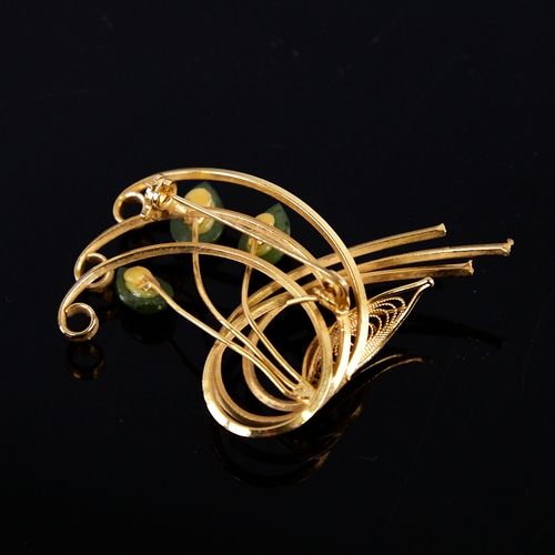 1245 - An eastern unmarked gold and jadeite floral brooch, brooch length 60mm, 8.4g