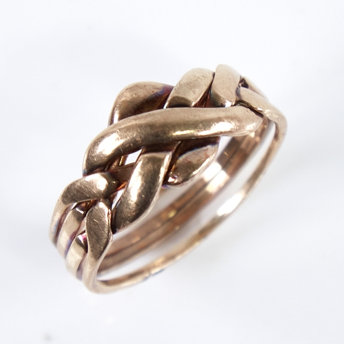 1251 - A modern 9ct gold puzzle knot ring, formed as 4 separate bands intertwined, setting height 10.8mm, s... 