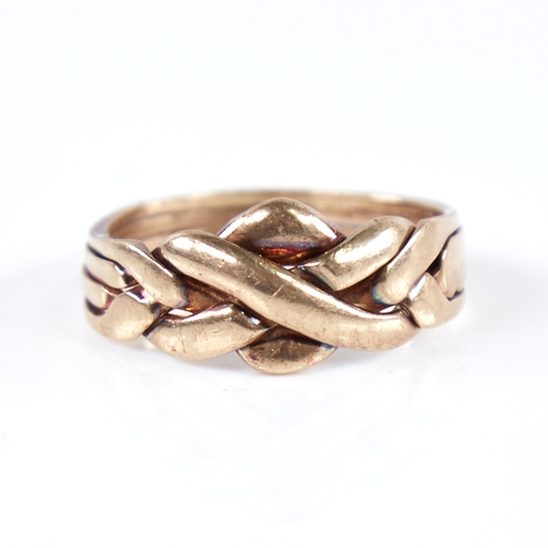 1251 - A modern 9ct gold puzzle knot ring, formed as 4 separate bands intertwined, setting height 10.8mm, s... 