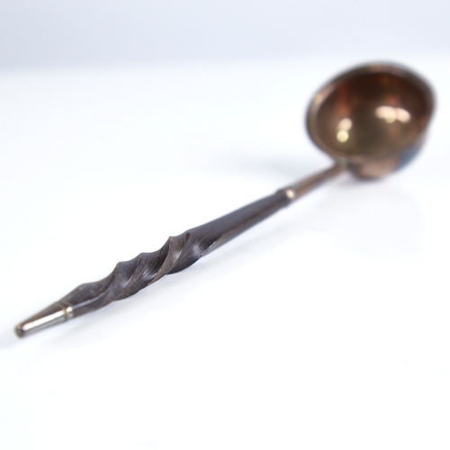 1256 - A small Georgian unmarked silver and whale baleen-handled toddy ladle, length 18cm