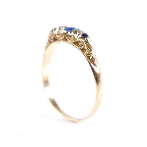 1257 - A 19th century 18ct gold graduated 5-stone blue glass sapphire and diamond half hoop ring, setting h... 