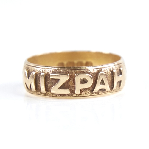 1258 - A late 19th century 18ct gold Mizpah band ring, textured half-band decoration with raised lettering,... 