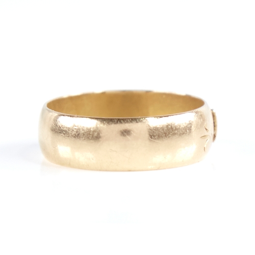 1258 - A late 19th century 18ct gold Mizpah band ring, textured half-band decoration with raised lettering,... 