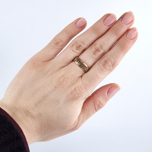 1258 - A late 19th century 18ct gold Mizpah band ring, textured half-band decoration with raised lettering,... 