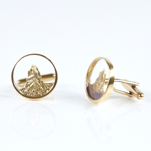 1264 - A modern pair of Continental 18ct gold mountain cufflinks, pierced and textured panels, maker's mark... 