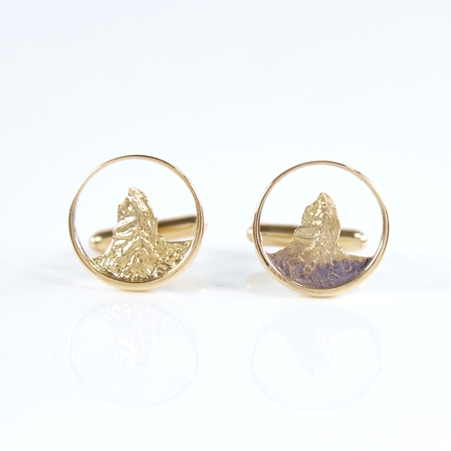 1264 - A modern pair of Continental 18ct gold mountain cufflinks, pierced and textured panels, maker's mark... 