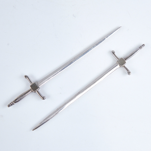 1268 - A pair of Victorian silver sword paper knives, by William Hutton & Sons, hallmarks Sheffield 1876, o... 