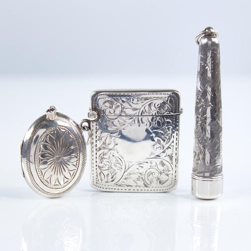 1275 - A George V silver Vesta case, a silver cheroot case and matching cheroot holder, and an Elizabeth II... 