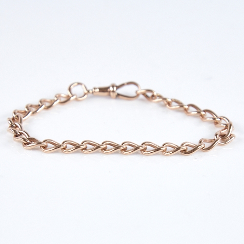 1281 - An early 20th century 9ct gold curb link bracelet, with dog clip, bracelet length 21cm, 14.5g