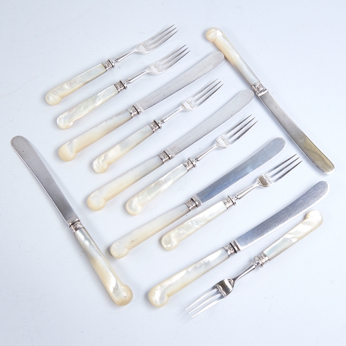 1282 - An Edwardian 6-place setting silver and mother-of-pearl handled pistol-grip dessert knives and forks... 