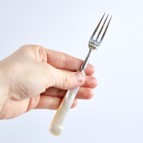 1282 - An Edwardian 6-place setting silver and mother-of-pearl handled pistol-grip dessert knives and forks... 